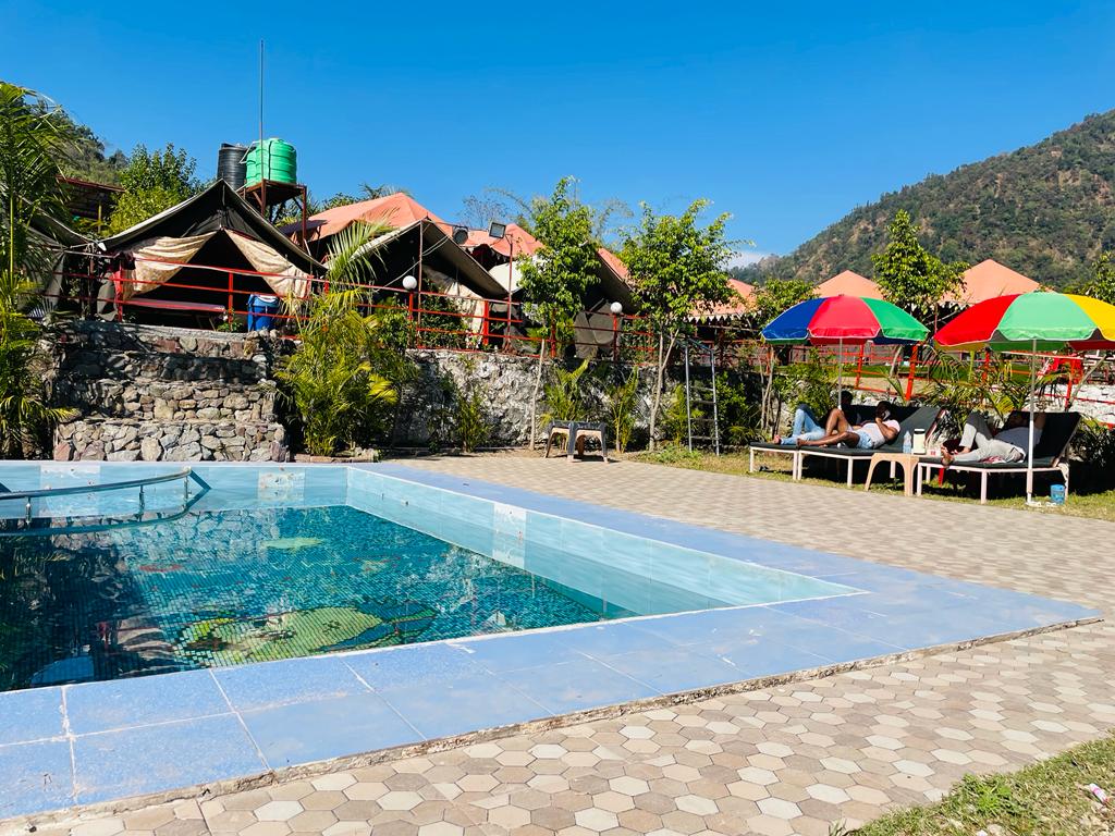 Swiss tent with swimming pool